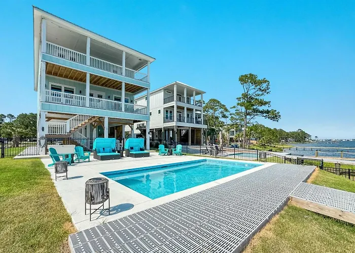 Water Oaks Lagoon House- Heated Pool Dock, Modern Waterfront Home