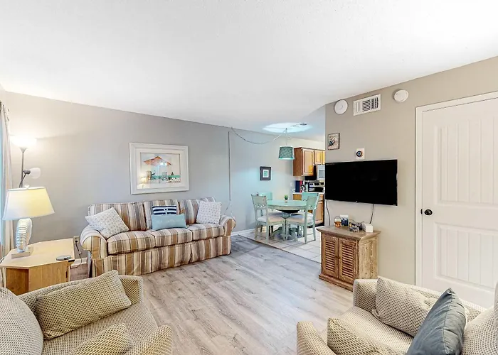 First-Floor Dog-Friendly Condo With On-Site Pool Beach Access & Balcony