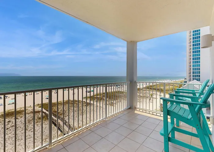 Beachfront Corner Condo W A Furnished Balcony Shared Pool & Grilling Area